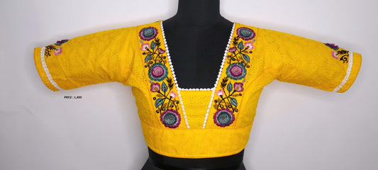 yellow blouse with floral design